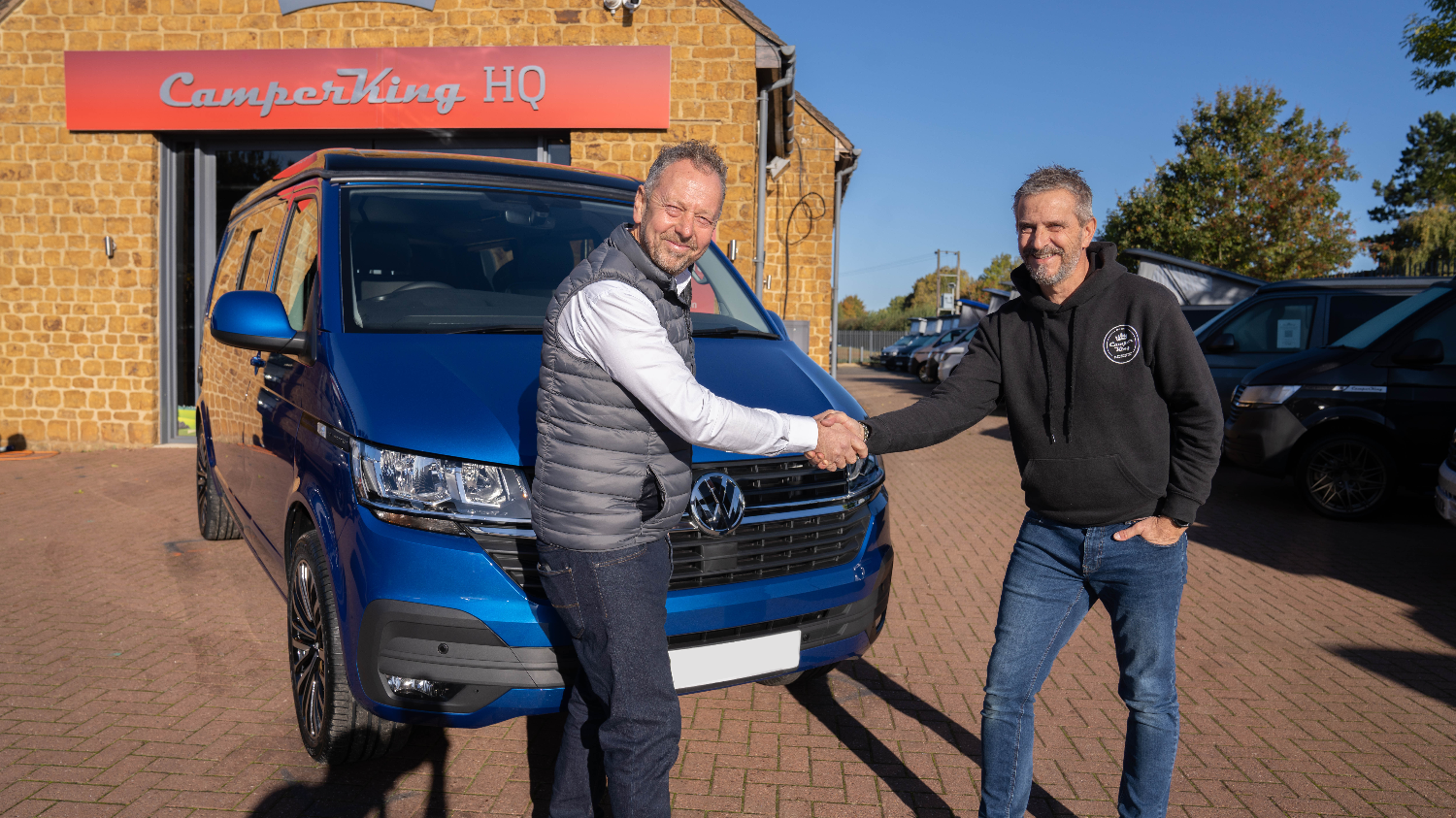 AEG MD Jason Pickerill (left) collects the company's first vehicle from CamperKing's Dealer Network Manager Steve Hayward